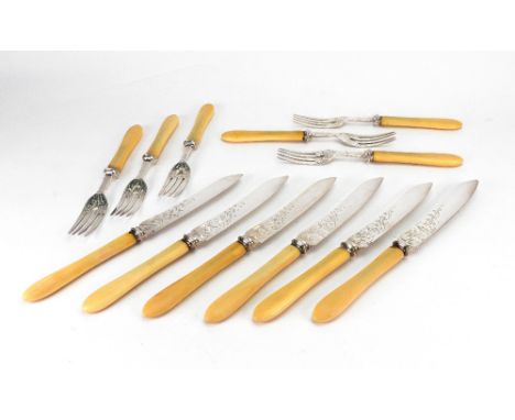 A set of six pairs of Victorian silver fish knives and forks, Sheffield 1874, makers mark J R., with ivy leaf engraving and b
