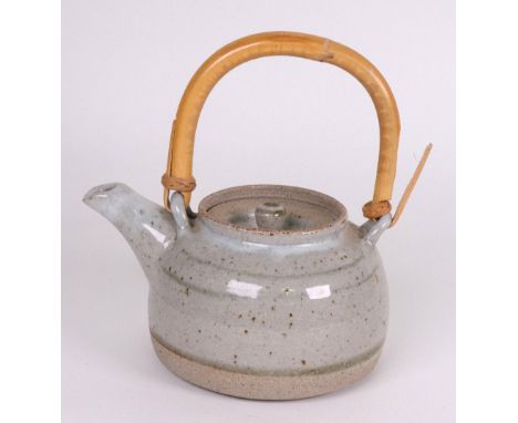 Attributed to David Leach (1911-2005), a Lowerdown Pottery stoneware teapot and recessed cover, decorated in simple celadon l