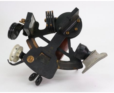 AM: A japanned sextant, first half 20th century, with brass scale of 3.5", radius and measuring to 1' no. 6B/177, in a fitted