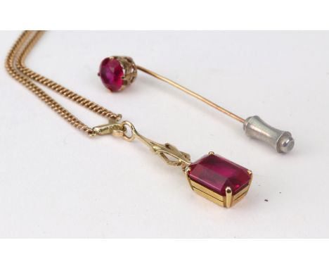 A 9ct gold and synthetic ruby pendant, earrings and stickpin, 10g gross, (4).