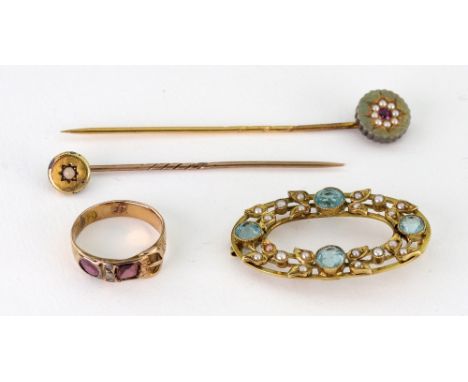 A small collection of jewellery, comprising; an early 20th century gold, half-pearl and pale-blue paste oval brooch of open f