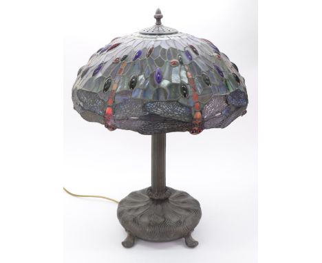 A reproduction Art Nouveau style table lamp with dragonfly shade, 60cm high.