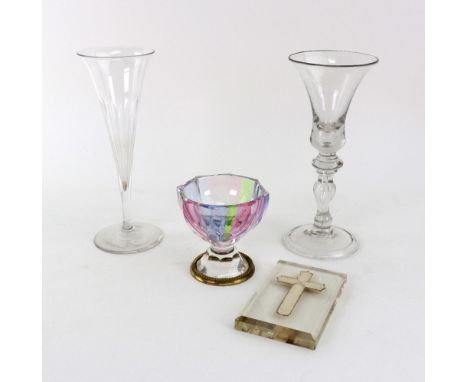 An English drinking glass, in mid 18th century style, with bell shape bowl and baluster stem, 18cm high, a facet cut champagn