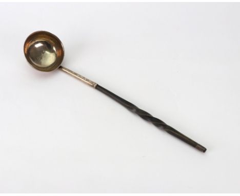 A George III silver toddy ladle, J. McKay, Edinburgh circa 1810, makers mark struck twice, with circular bowl and twist whale
