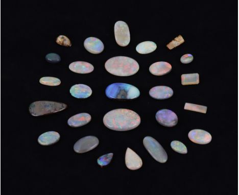 A group of 27 unmounted opals in various shapes, to include five boulder opals; an oval black opal approx. 9.7mm X 7.7mm; ten