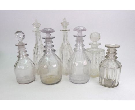 Three early 19th century glass maul shape decanters, with triple ring necks, another, lacking stopper, pair of late Victorian