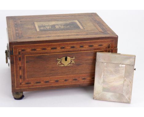 An early 19th century rosewood mahogany boxwood strung and banded rectangular sewing box, the hinged cover applied with a pri