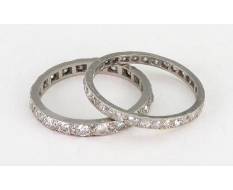 A diamond eternity ring, the 20 old-cut brilliant and single-cut stones approx. 0.05cts each, in an unmarked white metal sett