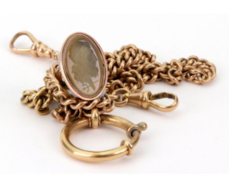 A continental yellow gold curb-link watch chain, with swivel-clip terminals, quartz intaglio pendant seal and large bolt-ring