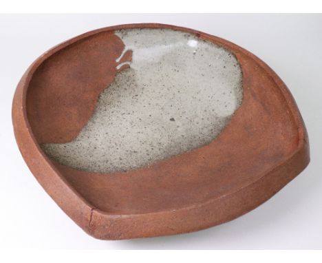Janet Leach (1918-1997), a large Leach Pottery stoneware circular slab bowl with a splashed, speckled ash glaze section, impr