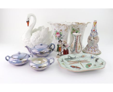 A French faience figure of a wizard, 21cm high, originally concealing a bell, a pair of Paris porcelain floral painted vases,
