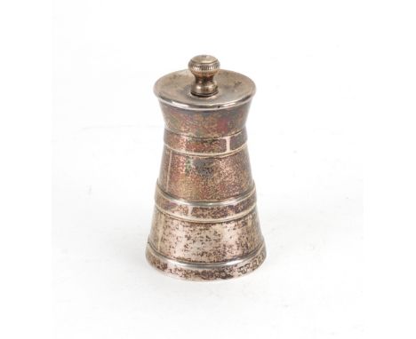 A silver pepper mill grinder, Goldsmiths & Silversmiths Company, London 1921, in the form of a churn, 7.5cm high.