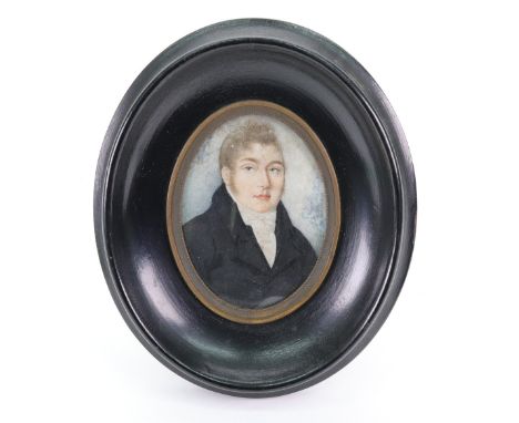English School, late 18th/early 19th Century, A portrait miniature of a gentleman in a black coat, watercolour, 7 x 5cm.