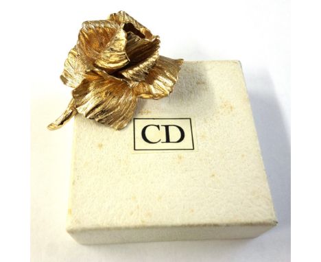 A Christian Dior gold-plated 'rose' brooch, applied plaque 'C Chr.Dior Germany', approx. 63mm high overall, in original white