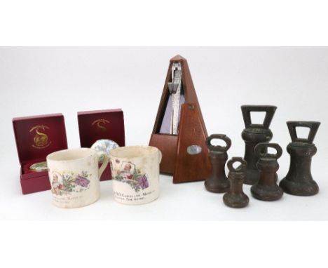 A Maelzel Paquet France metronome, 20th century, in mahogany finish case, 23cm high, a collection of six Victorian brass weig