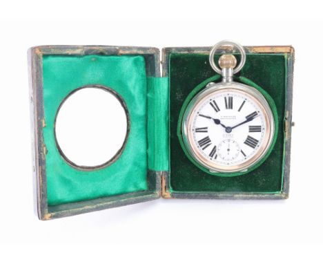 An Edwardian silver mounted leather covered watch stand, Birmingham 1907, engine turned, monogrammed and dated 1910, 12cm hig