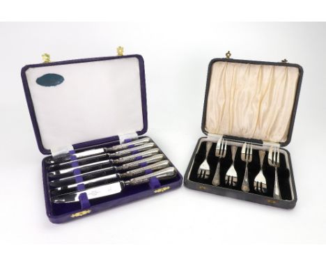 A cased set of six silver pastry forks, Emile Viner, Sheffield 1945, with wrigglework borders and a cased set of six silver g