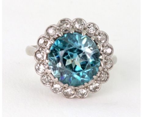 An early 20th century zircon and diamond cluster ring, centred with a blue zircon within a single cut and old-cut diamond 16 