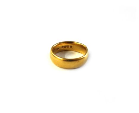 A 22ct yellow gold wedding band, Birmingham 1919, ring size M, 9.2g.