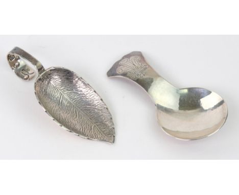 A Guild of Handicraft silver caddy spoon, London 1981, spot hammered and engraved with the Prince of Wales feathers and Ich D