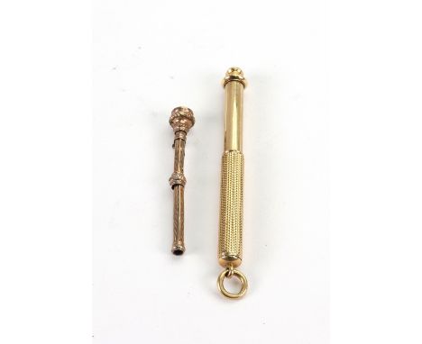 A late Victorian engine turned cylindrical cased propelling pencil, S Mordan & Co, with registration marks and another propel