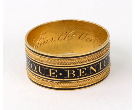 A George III gold and black enamel memorial band ring, the outside inscribed 'Docti Mentisque Benigne' (the Scientist's Mind 