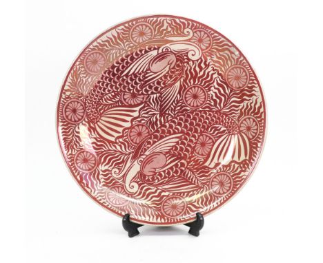 A ruby lustre dish painted by Charles Passenger, late 19th century, painted with two stylised fish amongst fronds and flower 