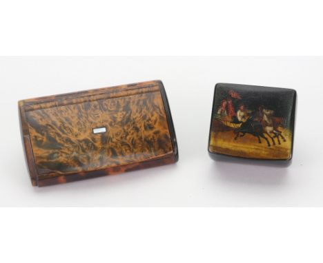A small Russian snuff box, late 19th century, the hinged cover painted with figures in a horse drawn sleigh, 4cm wide, and a 
