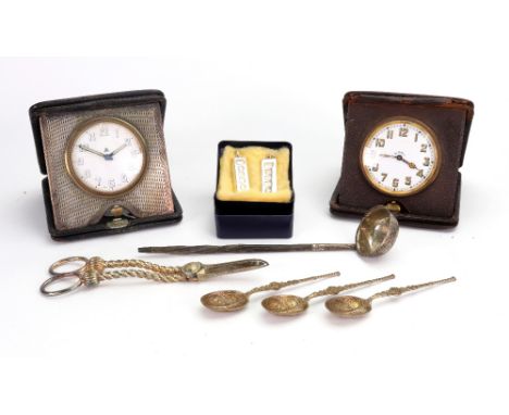 An engine turned silver mounted travel timepiece, Birmingham 1919, in folding square black leather case, the white enamel dia