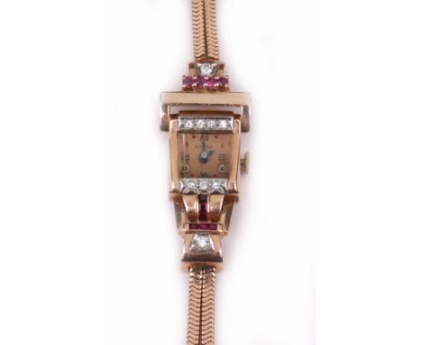 Bulova, a lady's rose gold, ruby and diamond cocktail watch, circa 1950, of abstract geometric design, the 12mm square dial s