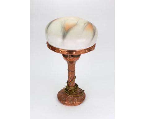 A copper Art Nouveau table lamp, with mushroom shape glass shade, 46cm high.