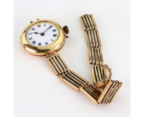 A 15ct gold manual wind wristwatch, on bi-colour gate-link bracelet strap, stamped '15c' white enamel dial with Roman numeral