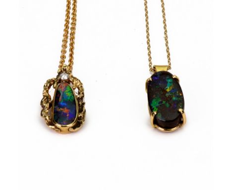 A black opal pendant, yellow metal set, inscribed 18ct, on fine neck chain, stamped '9ct' 2.9g gross and an opal and diamond 