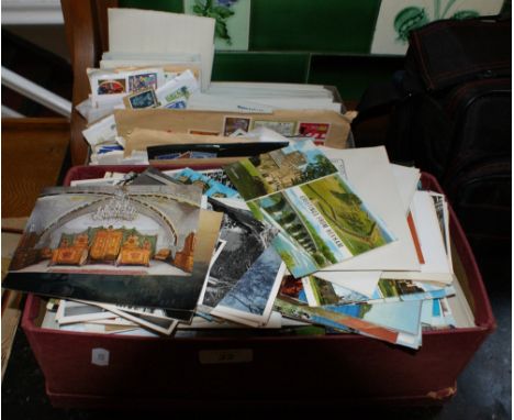 Two boxes of postcards, postage stamps & First Day Covers