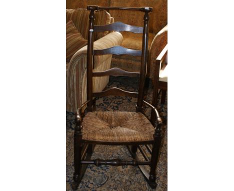 Ladder back rocking chair with rush seat