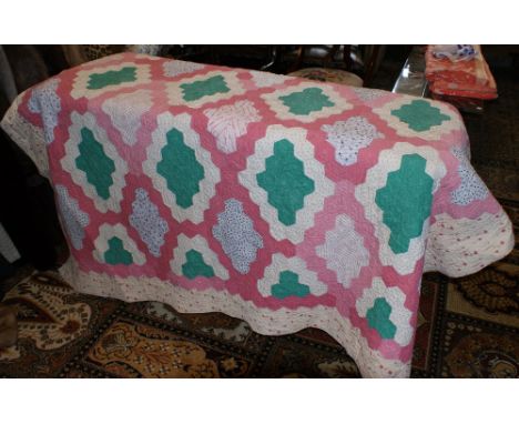 Vintage hand-stitched Durham quilt with one side patchwork, the other plain white