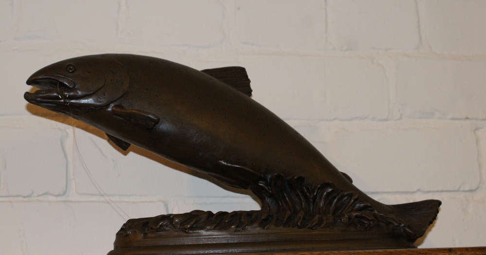 David Hughes Sculpture of a leaping salmon with hook and line