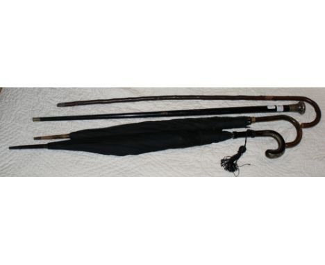 Vintage walking cane with Chinese silver top marked W.N., a rosewood walking cane with 9 ct gold mount engraved T.S. 1932, a 