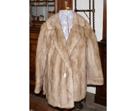 Ladies vintage mink jacket with brown fur trim