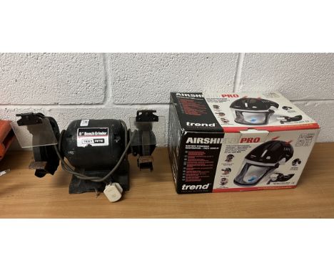 Bench grinder together with an Airshield Pro facemask 