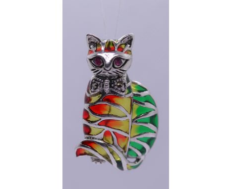 Silver &amp; enamel cat brooch/pendant with ruby set eyes 