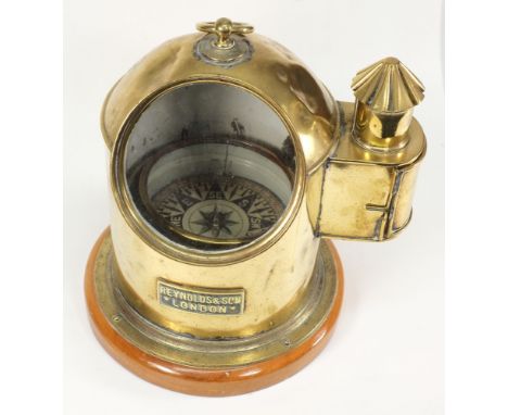 A 19th century brass binnacle by Reynolds & Son, London:, the lithograph printed dry card compass in a gimbaled mount  with o