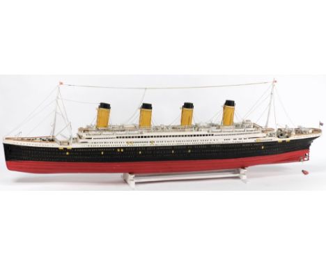 A scale model of the White Star liner RMS Titanic:, fully detailed with aerial masts, davits, lifeboats and appropriate perio