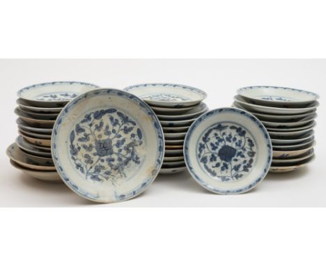 Tek Sing Cargo - thirty seven Chinese porcelain dishes: of circular form painted in blue with peony scroll designs within dou