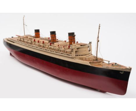 A scale model of RMS Queen Mary for Hamleys of London, possibly by Bassett Lowke: the removable upper deck with triple funnel