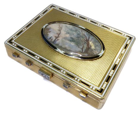 An 18-carat gold pill box with engine-turned cover with inset oval miniature painting, bordered by black and white enamel, th