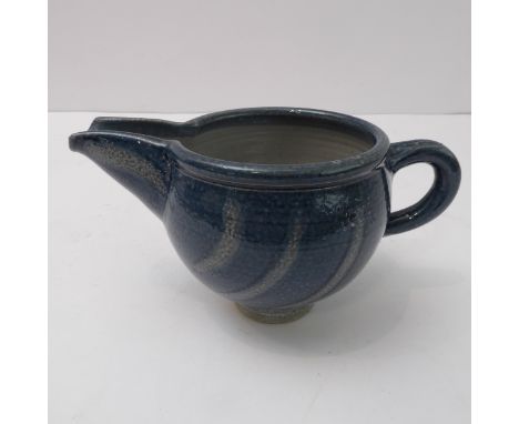Sheila Casson (Winchcombe Pottery&nbsp;and Wobage Pottery, Ross on Wye), bridge spouted jug; cobalt blue glaze with wax resis