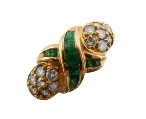 An emerald and diamond-set ring: the calibré-cut emerald centrally-set as an 'X' with a brilliant-cut diamond-set cluster to 