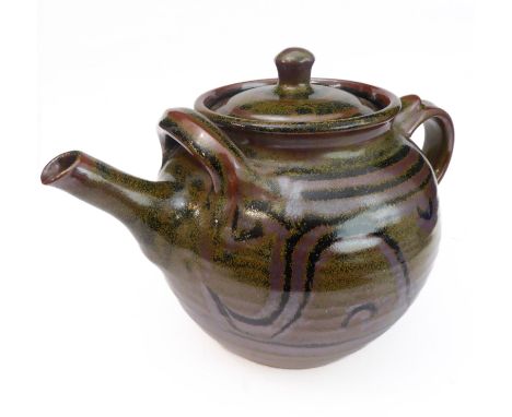 Ray Finch (Winchcombe Pottery, Gloucestershire), teapot: iron slip, combed decoration (18cm high)&nbsp;Provenance: The Chestn