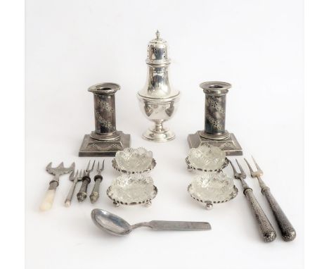 A selection of silver and silver-plate to include a hallmarked-silver caster, a pair of dwarf silver-plated candlesticks with